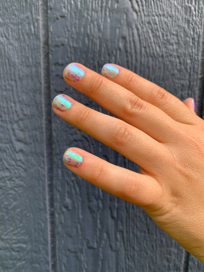 LOCAL BIRDS ERUPTING INTO HOOTENANNY AT THE SPIT OF SPRING SPRINKLERS