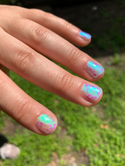 LOCAL BIRDS ERUPTING INTO HOOTENANNY AT THE SPIT OF SPRING SPRINKLERS