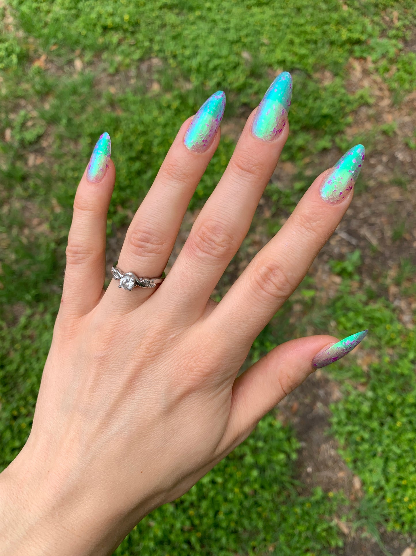 LOCAL BIRDS ERUPTING INTO HOOTENANNY AT THE SPIT OF SPRING SPRINKLERS