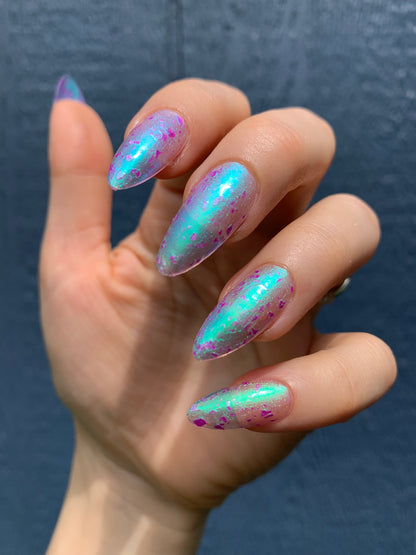 LOCAL BIRDS ERUPTING INTO HOOTENANNY AT THE SPIT OF SPRING SPRINKLERS