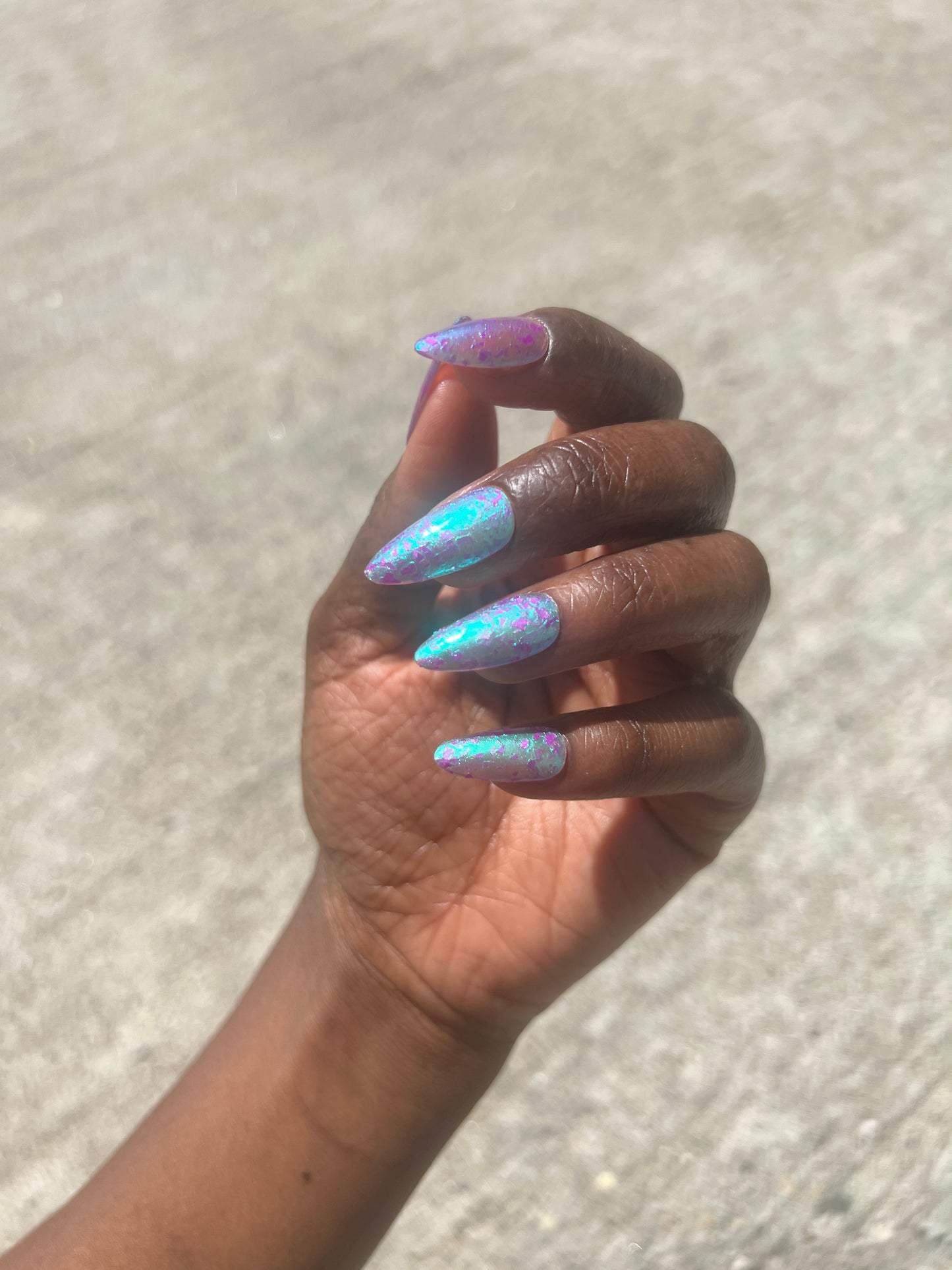 LOCAL BIRDS ERUPTING INTO HOOTENANNY AT THE SPIT OF SPRING SPRINKLERS