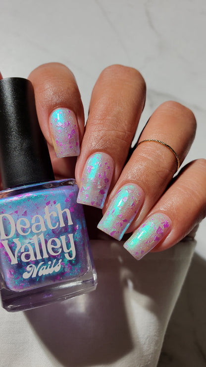 LOCAL BIRDS ERUPTING INTO HOOTENANNY AT THE SPIT OF SPRING SPRINKLERS