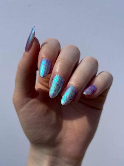 LOCAL BIRDS ERUPTING INTO HOOTENANNY AT THE SPIT OF SPRING SPRINKLERS